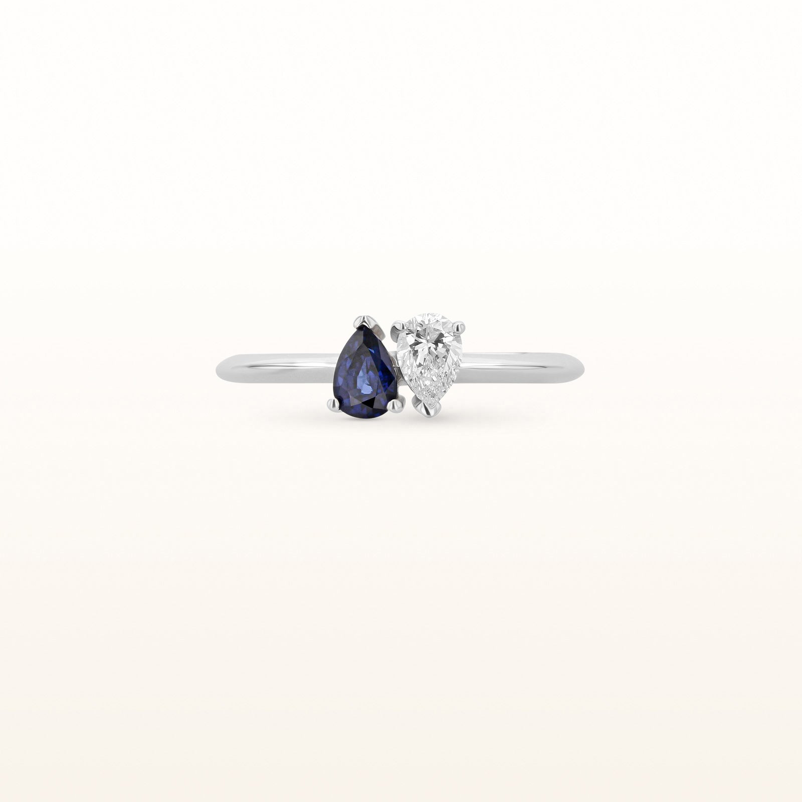 Napoleon Bonaparte Inspired Opposing Pear-Shaped Blue Sapphire and Diamond Ring