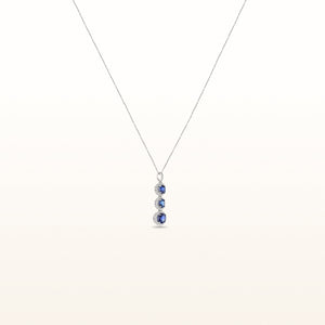 Round 3-Stone Blue Sapphire and Diamond Halo Pendant in 18kt White Gold