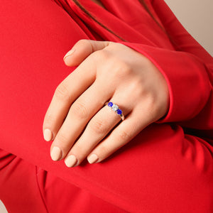 Round Diamond and Blue Sapphire Three-Stone Ring in 14kt White Gold