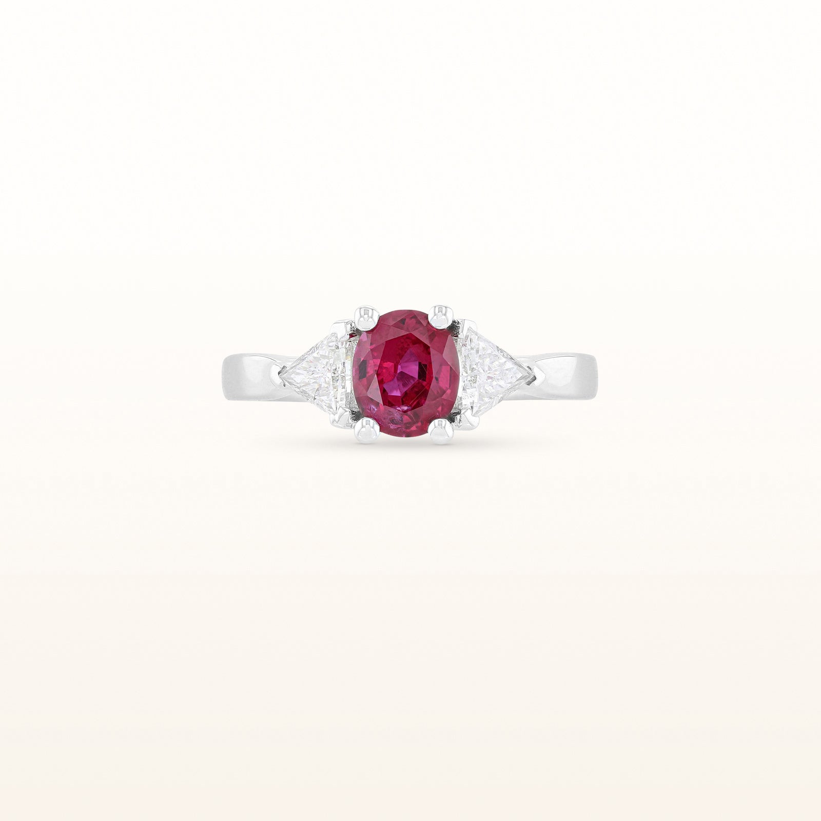 Oval Ruby and Trillion Side Diamond Ring in 14kt White Gold