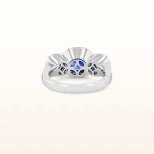 Signature Cushion Cut Three-Stone Blue Sapphire and Diamond Halo Ring in 18kt White Gold
