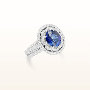 5.30 ctw Oval Blue Sapphire and Diamond Scalloped Halo in 18kt White Gold