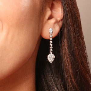 Signature Heart Shaped Diamond Dangle Earrings in 18kt White Gold