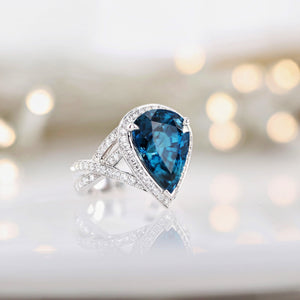 Signature Pear-Shaped Blue Zircon Ring with Diamond Halo in 18kt White Gold