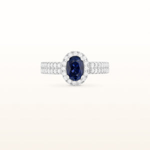 Oval Blue Sapphire and Diamond Halo Ring in 18kt White Gold