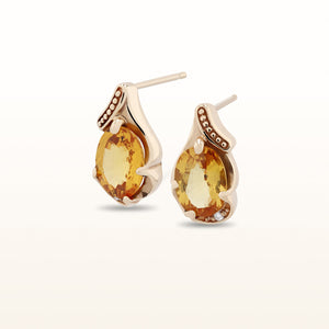 Oval Orange Sapphire and Diamond Accent Earrings in 14kt Yellow Gold