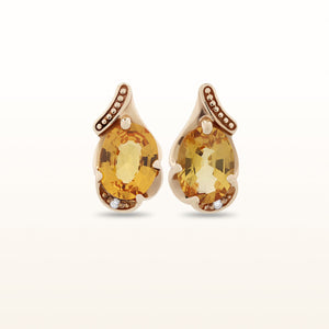 Oval Orange Sapphire and Diamond Accent Earrings in 14kt Yellow Gold