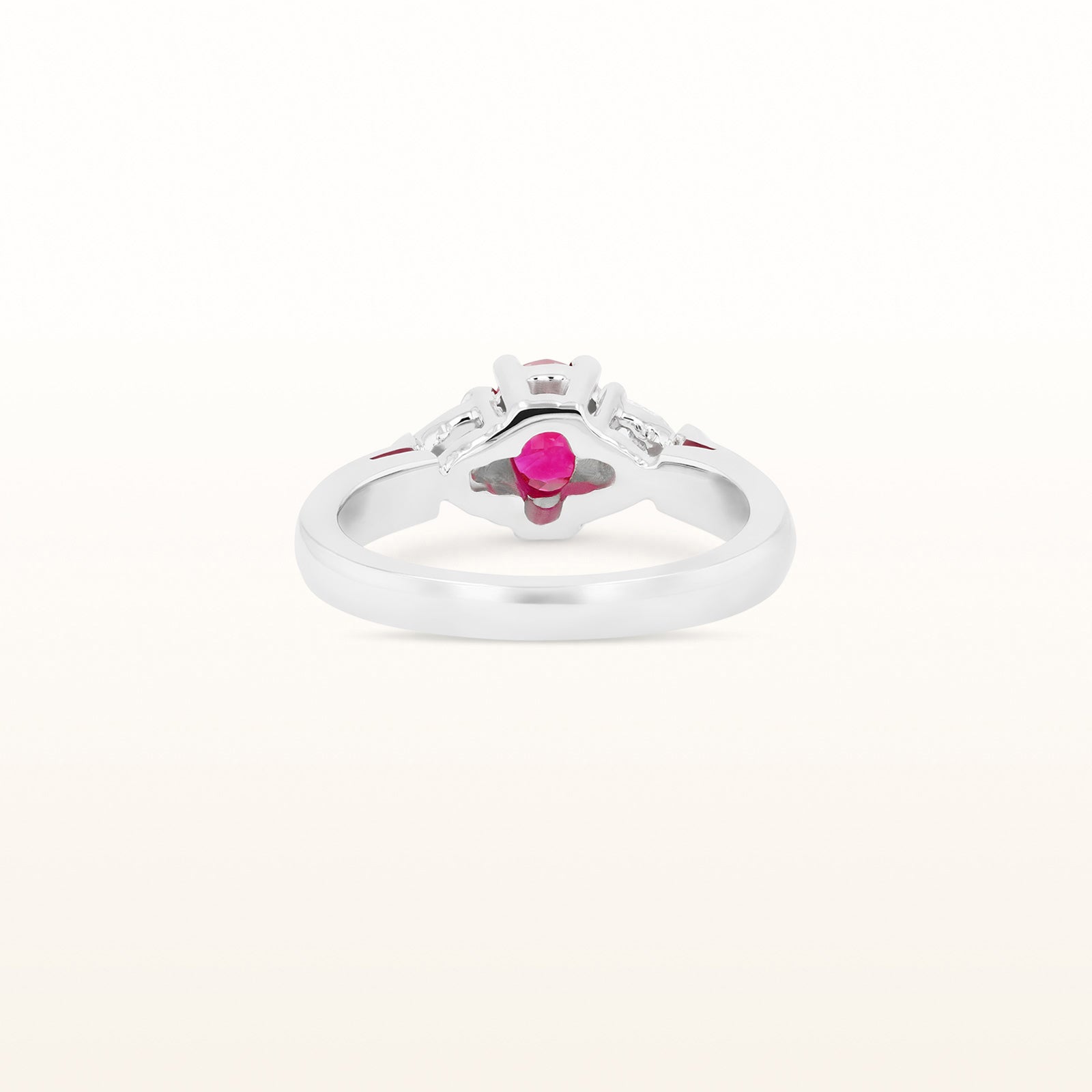 1.25 ctw Oval Ruby and Trillion Diamond Three-Stone Ring in 14kt White Gold