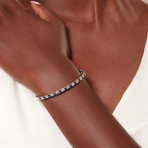 Alternating Diamond and Blue Sapphire Hinged Bangle Bracelet in 14kt White Gold