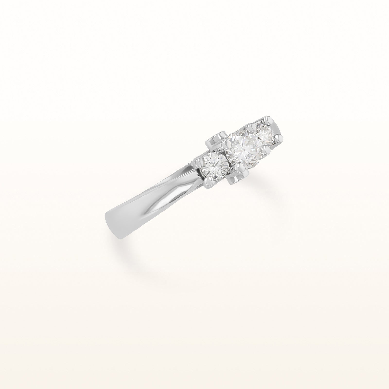 1/2 ctw Three-Stone Diamond Ring with Profile Diamond Accents in 14kt White Gold